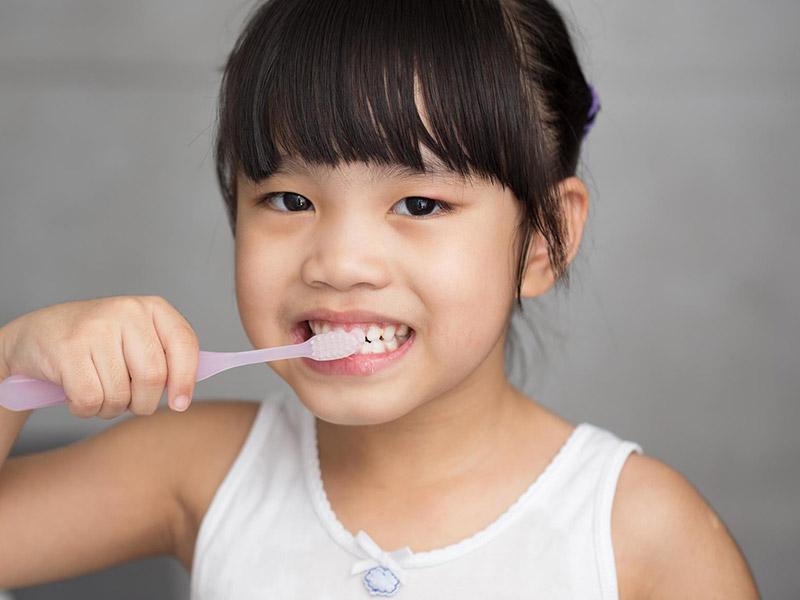 tooth paste on tooth brush